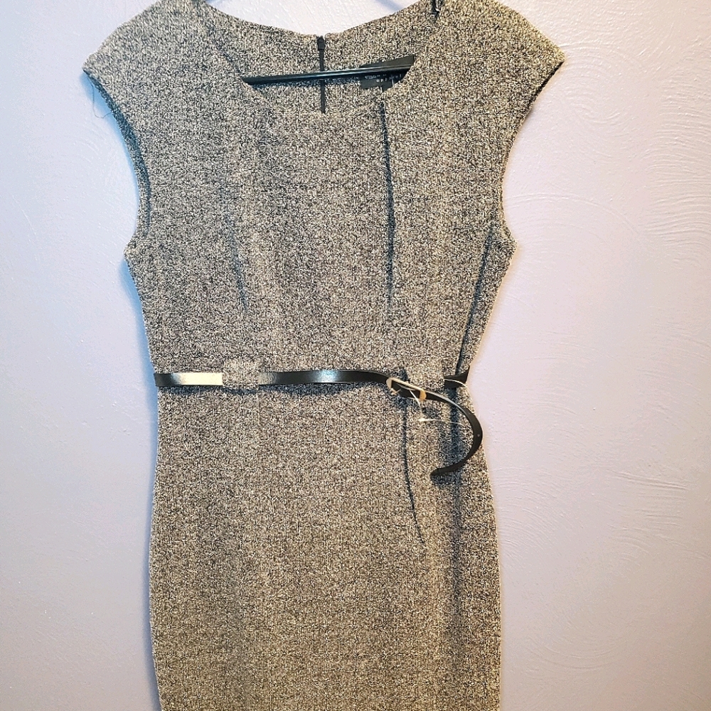 Brand new knee length dress with tags.